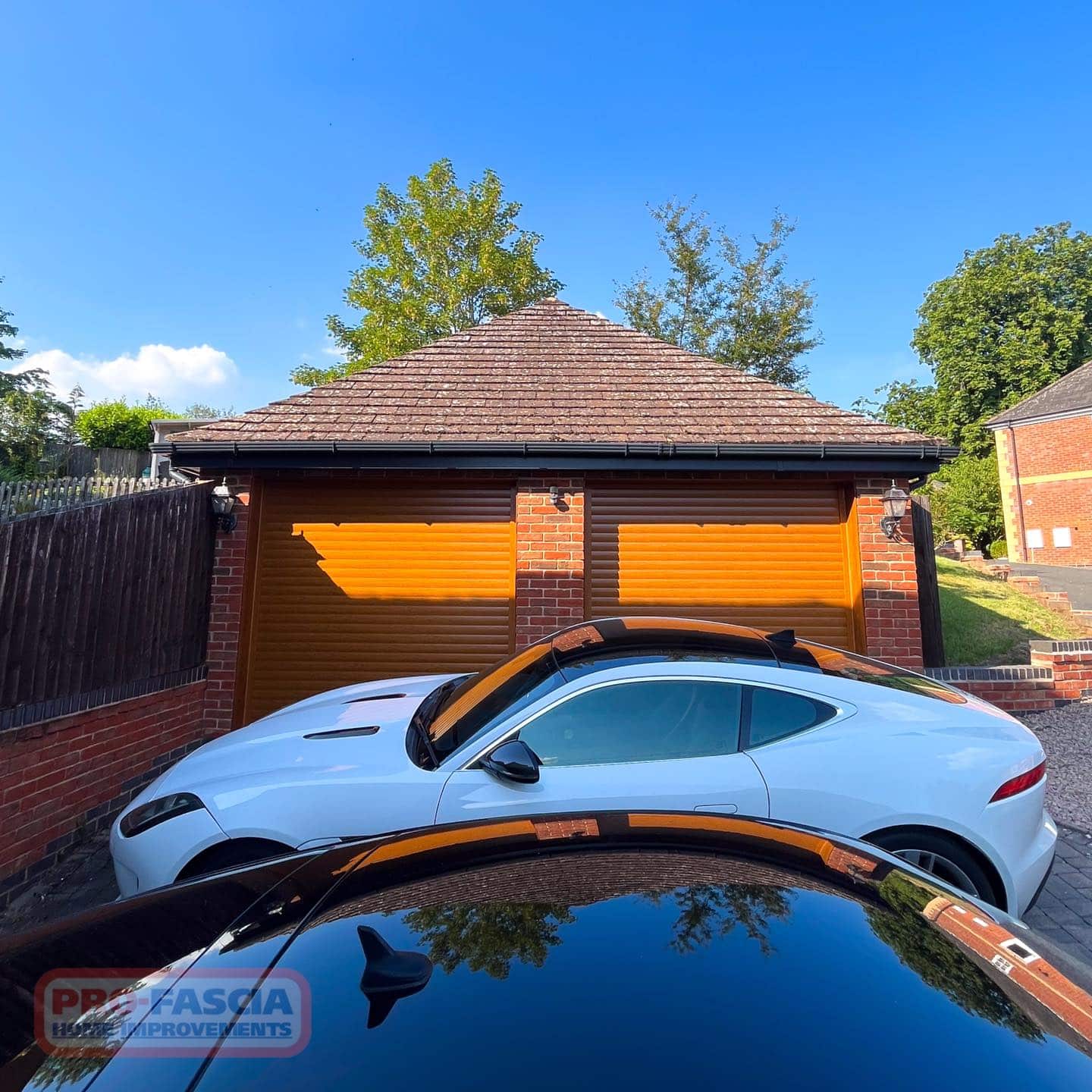 Pro-Fascia Home Improvements: Elegant Roofline and Entryway Upgrade in Redditch