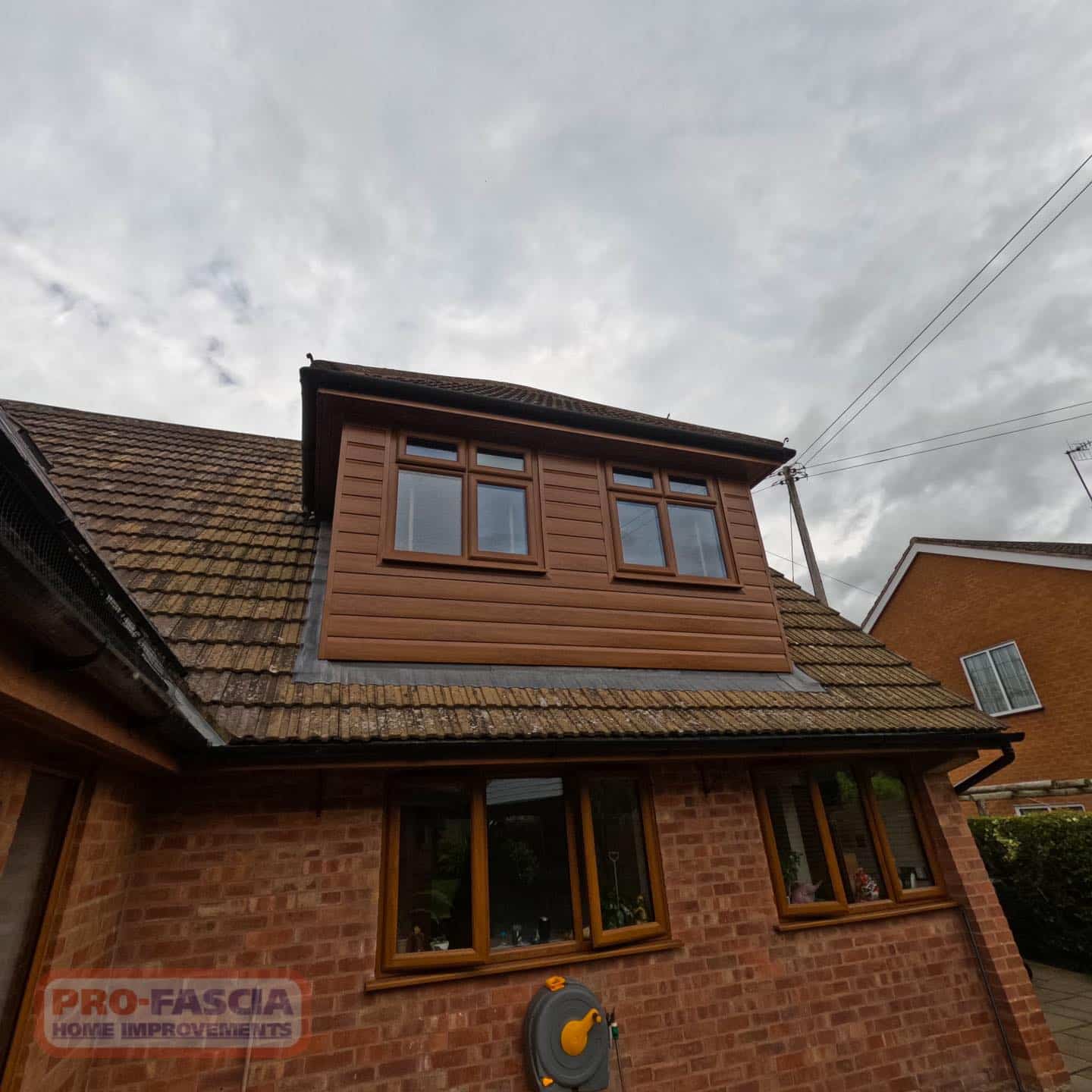 Dormer Cladding Transformation with Light Oak Shiplap in Worcester