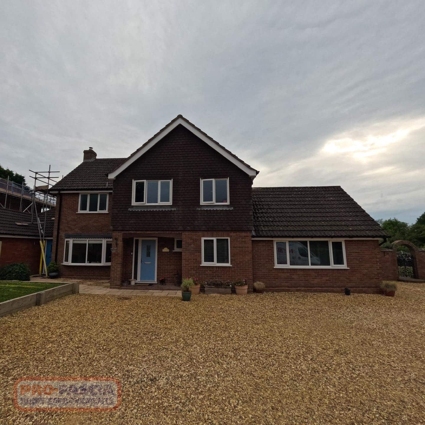 Crisp White Fascia & Soffits with Black Ogee Guttering in Worcester