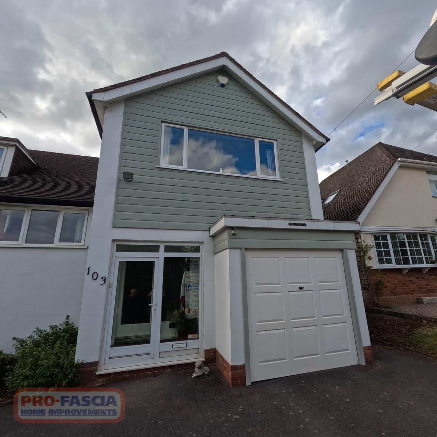 Pro-Fascia Home Improvements recently replaced old timber cladding with sleek and modern sage green shiplap cladding